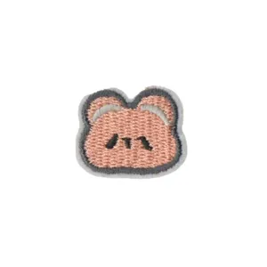 Joli patch en tissu brodé de personnage de dessin animé rose pour décoration de vêtements.