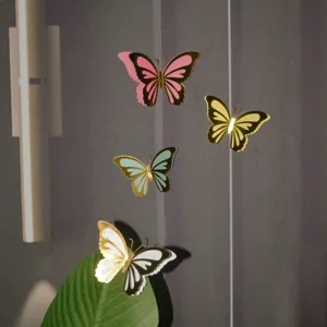 Adesivi da parete a farfalla cava 3D a doppio strato glitterati decorativi per feste.