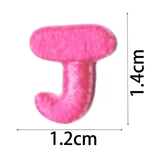 Pink embroidered letter J patch, cute mini DIY clothing accessory and iron-on badge for decor.