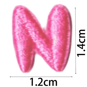 Close-up detail of the pink letter N embroidery patch, size 1.2x1.4cm, cute DIY accessory.