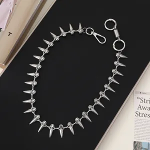 Punk style silver metal pants chain with sharp spikes, edgy hip hop waist accessory.