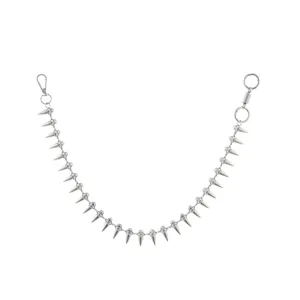 Detailed view of punk spike metal pants chain, silver hip-hop waist chain accessory.
