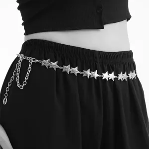 Silver star waist chain detail shot, stylish metal pants chain for trendy dress accessory.