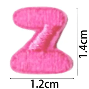 Pink embroidered letter Z patch, mini cute DIY decorative clothing accessory, detailed view.
