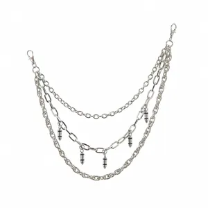 Detailed shot of multi-layer metal pants chain with bullet charms and size markers.