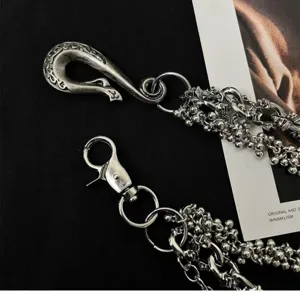 Detailed view of vintage heavy metal pants chain with intricate hooks and layered chains.