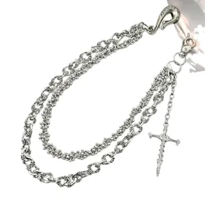 Metal pants chain, heavy double-layered skull design with cross pendant, fashion punk style.