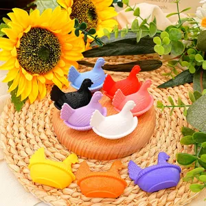 Close-up detail of colorful 3D printed chicken fridge magnets, cute decorative hen animal decor.
