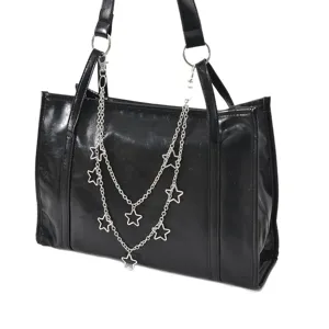 Sac cabas noir en cuir PU avec double chaîne et pendentifs étoiles pour femmes élégantes.