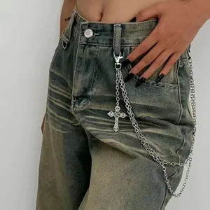 Multi-layer cross pendant pant chain, gothic metal waist chain for jeans and streetwear style.
