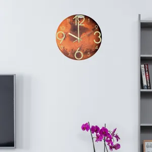 Mars glow wall clock detail view showing luminous numbers and unique planet texture surface.