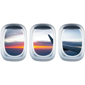 Vista dettagliata di 3 adesivi murali oblò d'aereo con tramonto e vista spettacolare.
