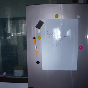 Magnetic whiteboard sticker for fridge memo, waterproof PVC wall decal with colorful magnets.