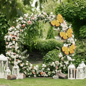 Detailed view of 3d hollow butterfly wall sticker, hanging on floral arch for party decor.