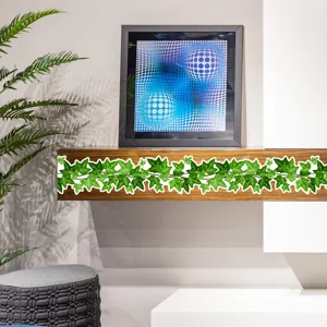 Close-up of green ivy vine wall sticker detail, showing vibrant leaves on wooden shelf setup.