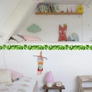 Green ivy vine wall sticker, self-adhesive floral border decal for bedroom living room decor.