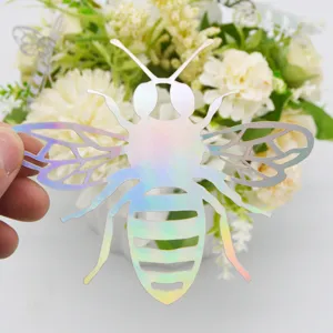 Detailed view of 3D holographic hollow bee wall sticker for home wedding party decor.