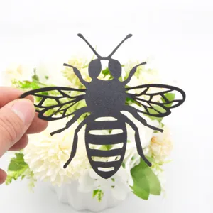 Detail view of 3D hollow black bee wall sticker, exquisite cutout design for home party decor.