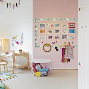 Eucalyptus leaf border wall sticker for kids room DIY decoration, stylish pink wall backdrop.