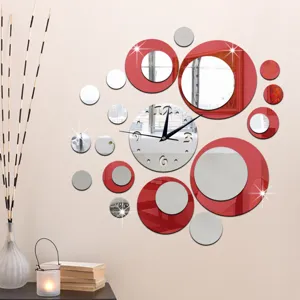 Close-up detail of the DIY round acrylic wall clock with red silver mirror elements on wall.