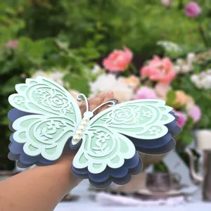 3D layered hollow butterfly wall stickers with pearls for wedding and home decor.