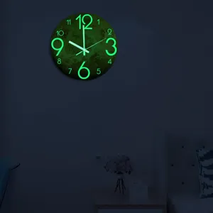Detail shot of the luminous wall clock glowing in a dark bedroom, acrylic glowing numerals.