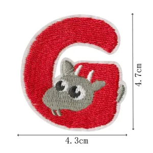 Detailed view of creative animal letter C embroidered cloth patch with cute grey sheep design.