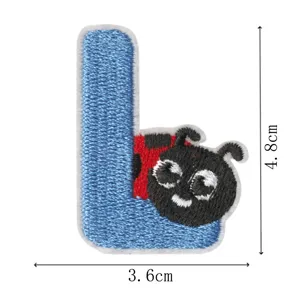 Detailed view of the letter L embroidered patch featuring a cute ladybug animal design.