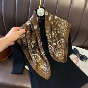 Elegant brown silk square scarf with vintage paisley floral print, luxurious fashion accessory.