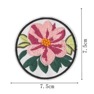 Round embroidered patch detail, peony floral design with green leaves, 7.5cm size.
