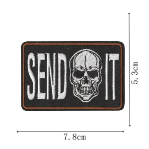 Detailed shot of tactical skull embroidered patch with clear stitching and size dimensions.