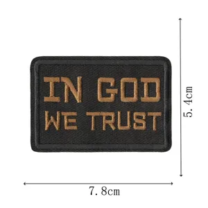 Tactical embroidered patch with In God We Trust motto, durable hook loop badge for apparel.