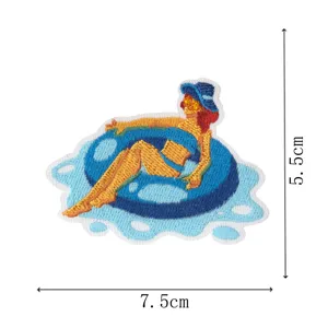 Embroidered patch featuring a beach girl on a blue swim ring, size 7.5x5.5cm for clothing decor.