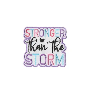 Embroidered iron-on patch featuring inspirational quote text, perfect for clothing and bags.