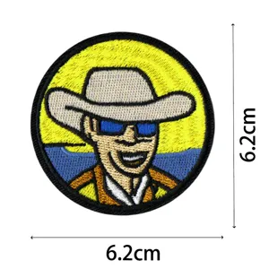 Round embroidered cowboy patch clothing badge with detailed stitching, measuring 6.2cm.