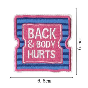 Close-up detail of a colorful embroidered patch with funny text design, premium texture and clear edges.