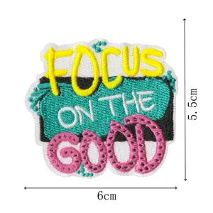 Embroidered motivational patch featuring focus on the good text, ideal for jackets and bags.