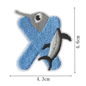 Creative blue swordfish letter X embroidery patch with size details for clothing decoration