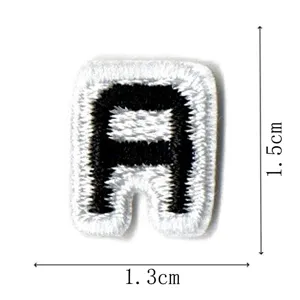 Small embroidered letter patch detail, black and white alphabet patch, 1.3x1.5cm size.