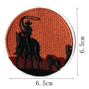 Detailed close-up of a round western cowboy embroidered patch, showing fine stitching.