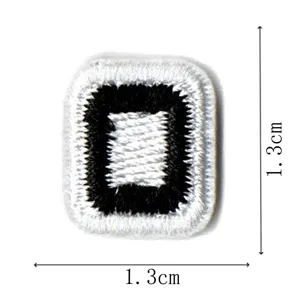 Small black and white square embroidery cloth patch DIY clothing accessory decorative badge.