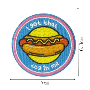 Detailed view of the cute hot dog embroidered patch, perfect for jackets and bags decoration.