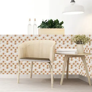 Detail view of mosaic tile sticker, beige and brown square pattern for wall renovation.