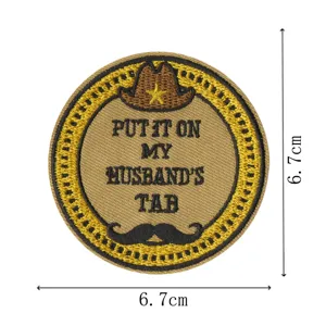 Round western cowboy embroidered cloth patch with funny text design, clothing accessory badge.