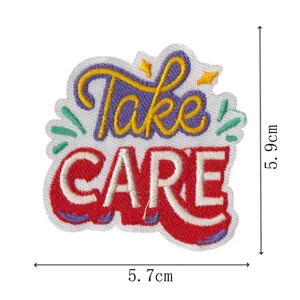 Bestickter Aufnäher mit Take Care Motivationsspruch für DIY Kleidung Applikation.