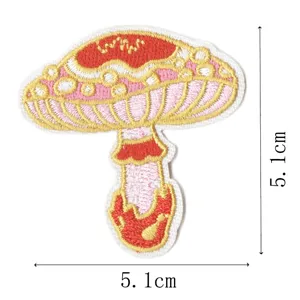 Embroidered mushroom patch detailed view, colorful fabric badge for clothing, bags and DIY decoration.