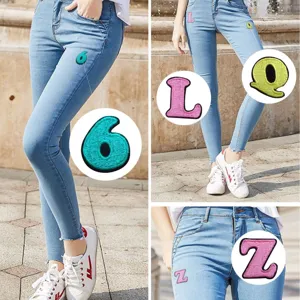 Colorful embroidered alphabet patches letter and number iron-on clothing accessories for DIY decor.