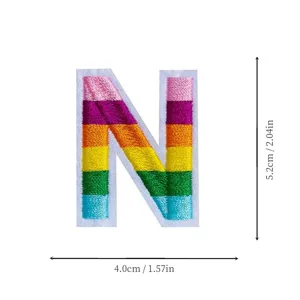 Rainbow embroidered letter N patch, colorful striped alphabet badge for DIY clothing and school uniforms.