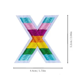 Detailed view of the colorful rainbow embroidered letter X patch for clothing and uniform decor.