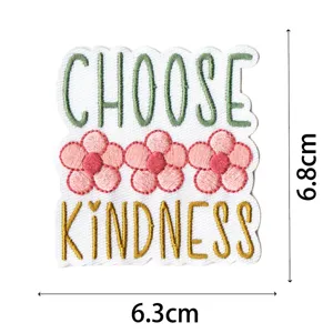 Embroidery patch detail showing 'Choose Kindness' text and pink flowers with size 6.3x6.8cm